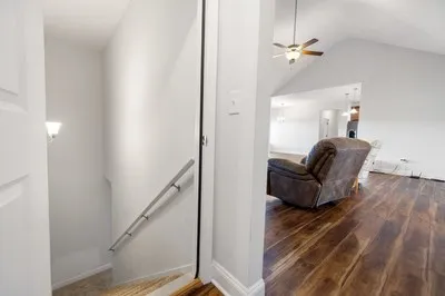 a view of a door and chair in the room