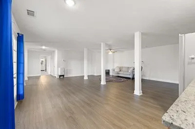 a view of a house with a mountain yard