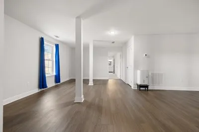 an aerial view of a house with outdoor space