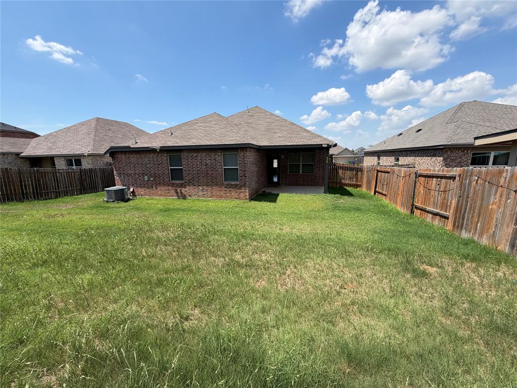 1601 Conley Lane Crowley, TX 76036 - Photo 13 of 17 a view of a house with yard and porch