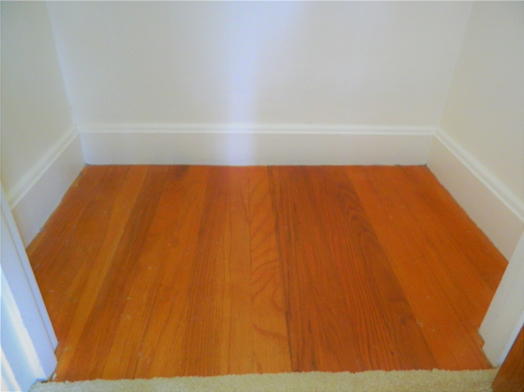 55 Kiwanee Road Warwick, RI 02888 - Photo 6 of 40 Condition of Hardwoods under carpet.