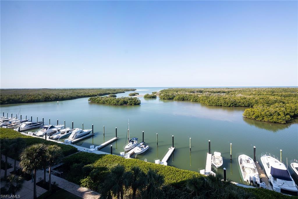 435 Dockside Drive, Unit B703 Naples, FL 34110 - Photo 10 of 38 a view of a lake with houses in outdoor space
