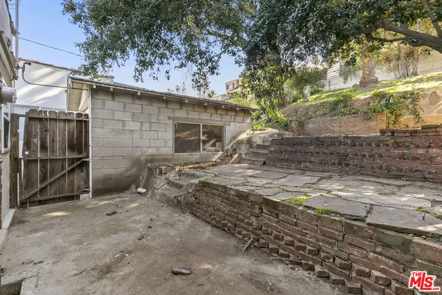 a view of a yard with trees