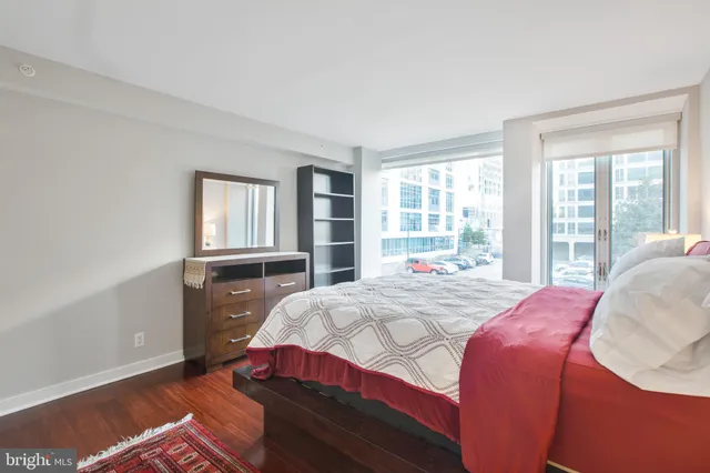 a living room with patio furniture and a couch