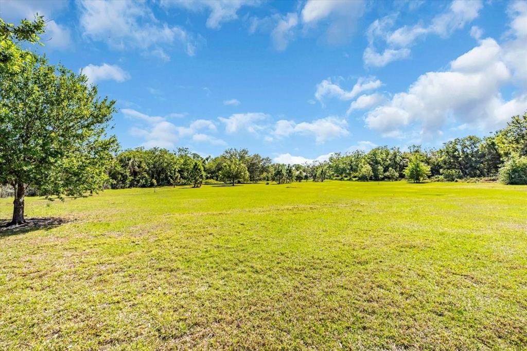 2211 Englewood Road Englewood, FL 34223 - Photo 11 of 86 a view of an ocean and a building