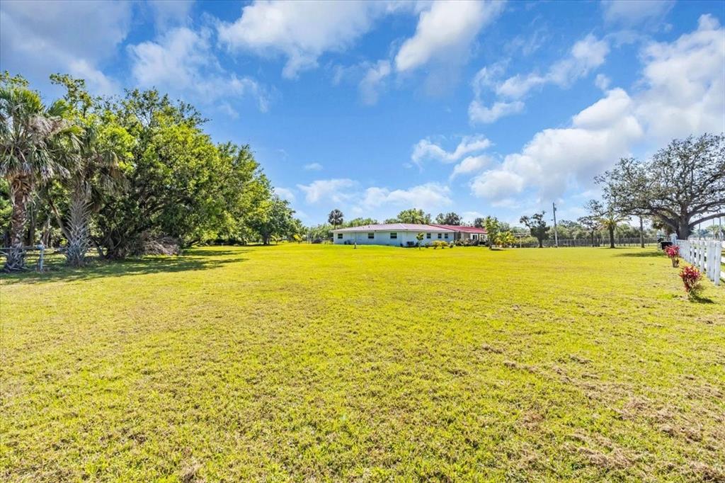 2211 Englewood Road Englewood, FL 34223 - Photo 7 of 86 a view of an ocean and beach