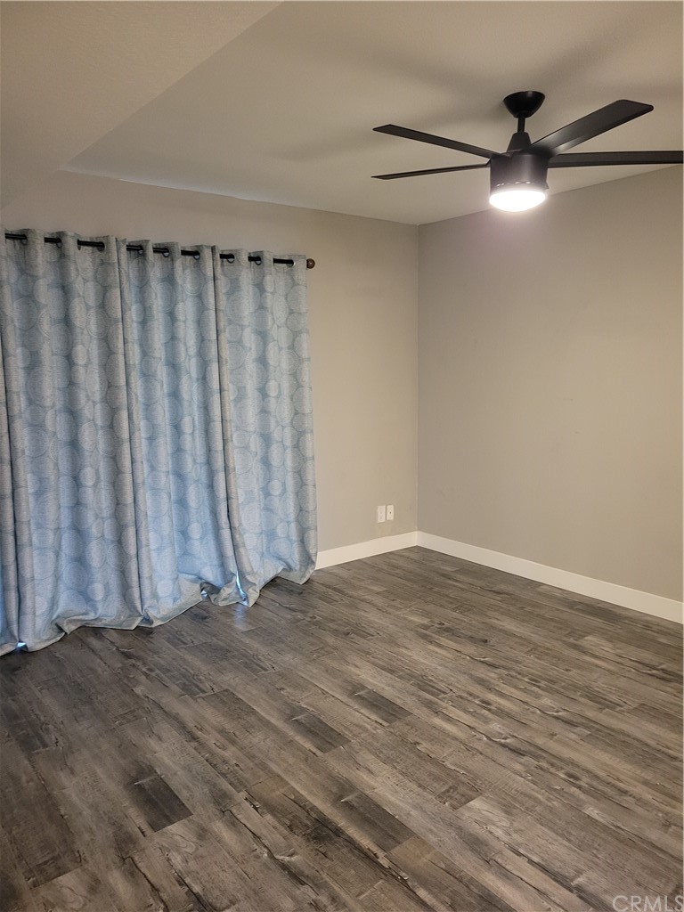 34026 Selva Road, Unit 68 Dana Point, CA 92629 - Photo 4 of 16 a view of an empty room with a window