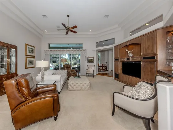 a large kitchen with a table and chairs in it