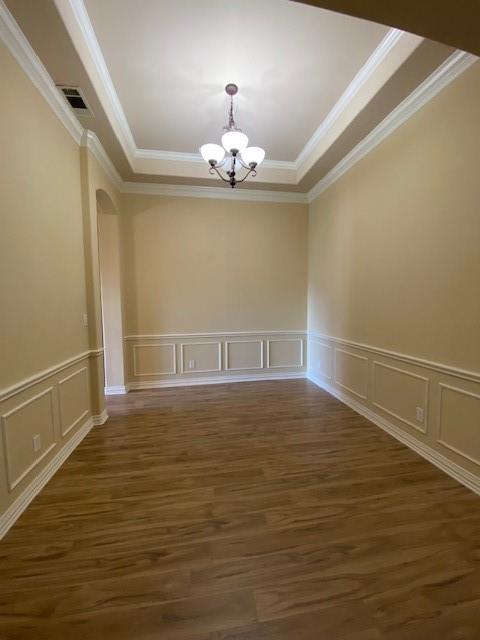 4952 Stephanie Street Frisco, TX 75033 - Photo 4 of 21 a view of an empty room with wooden floor and a window
