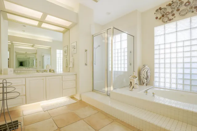 a bathroom with a bathtub and a sink