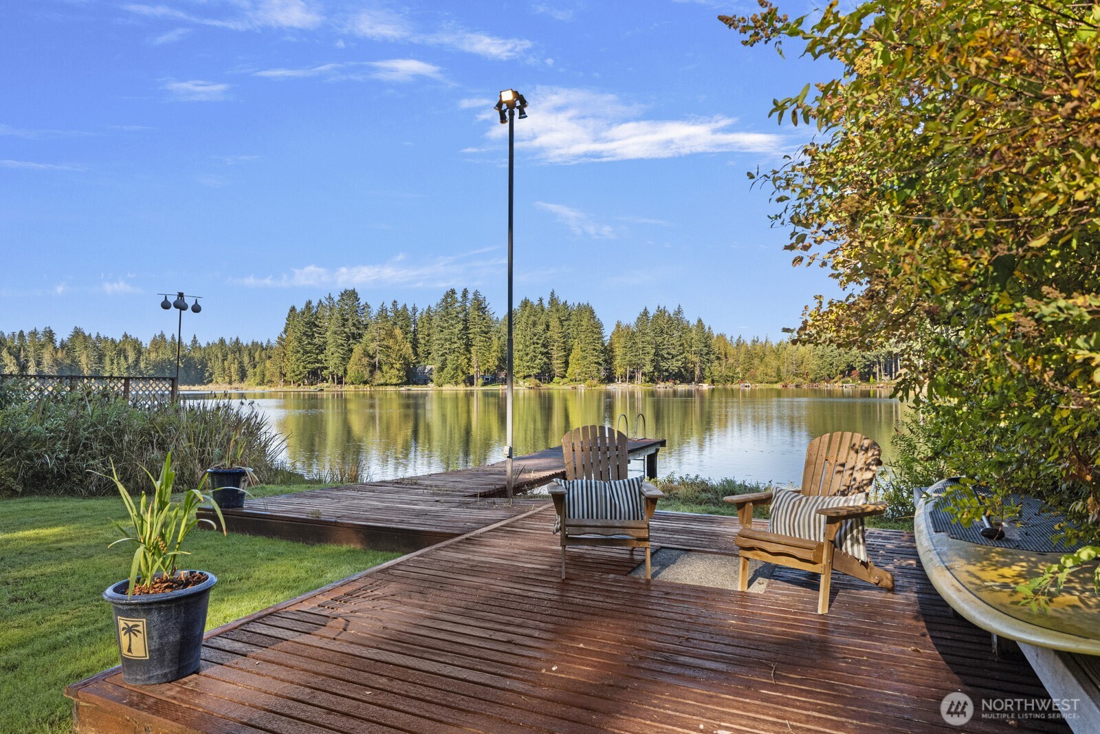 a lake view with a sitting space
