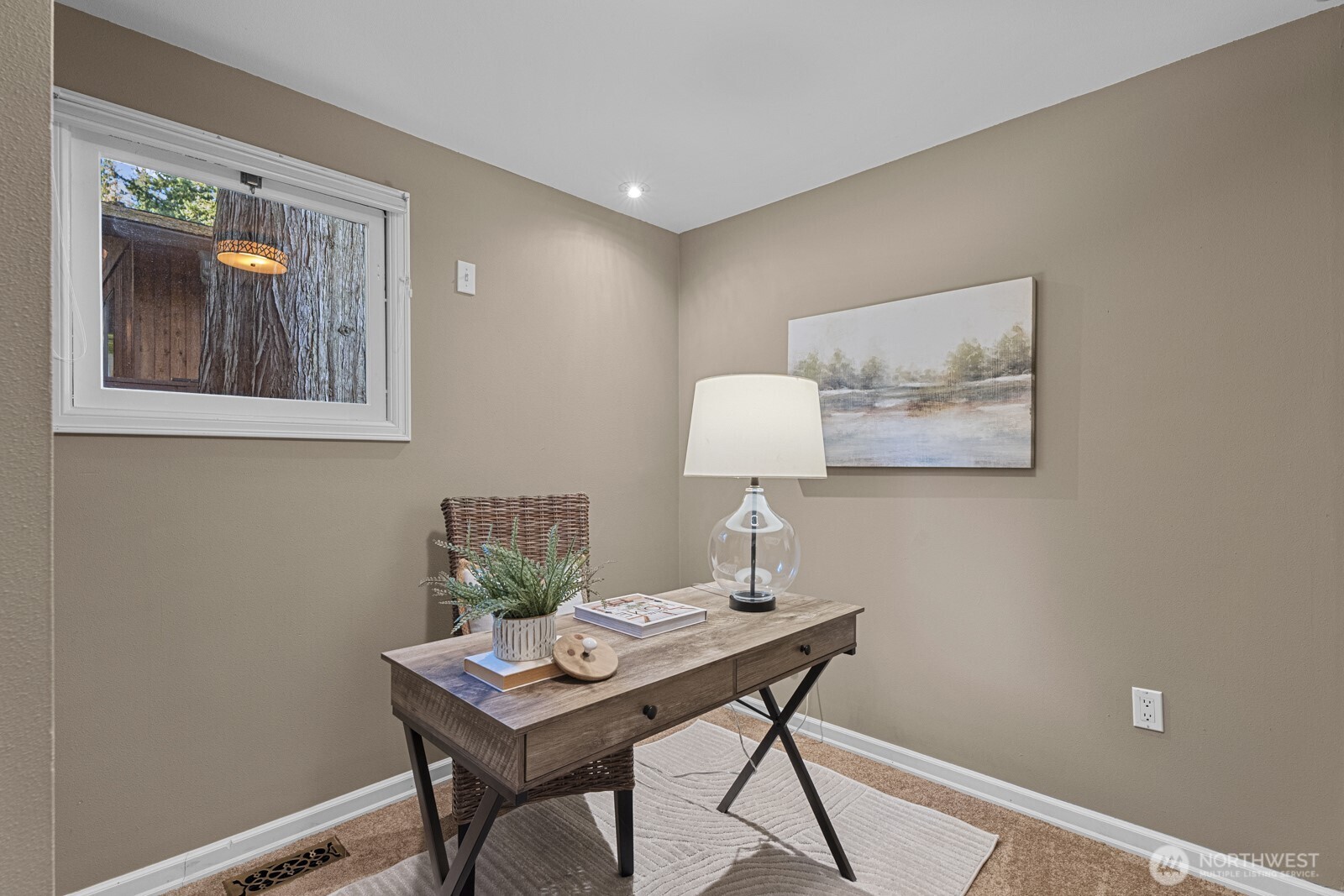 7727 Lake Alice Road Southeast Fall City, WA 98024 - Photo 16 of 34 a view of a workspace with furniture