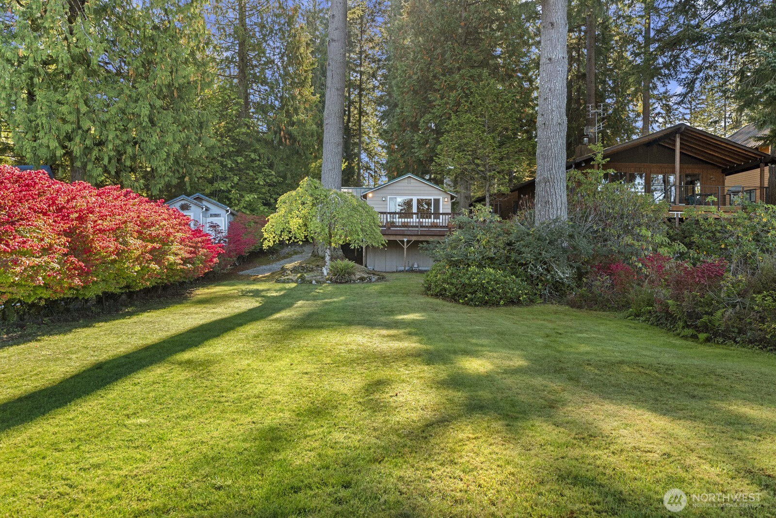 7727 Lake Alice Road Southeast Fall City, WA 98024 - Photo 25 of 34 a front view of a house with garden