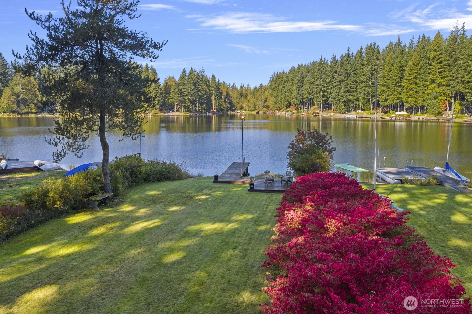 7727 Lake Alice Road Southeast Fall City, WA 98024 - Photo 29 of 34 a backyard of a house with lots of green space and lake view
