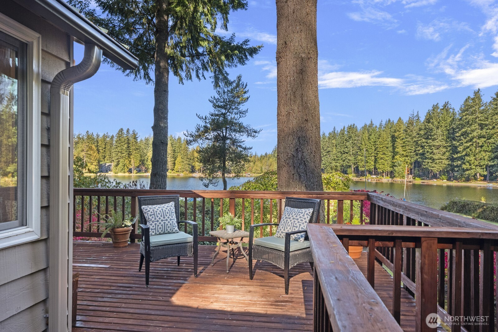 7727 Lake Alice Road Southeast Fall City, WA 98024 - Photo 3 of 34 a view of a chairs on the roof deck