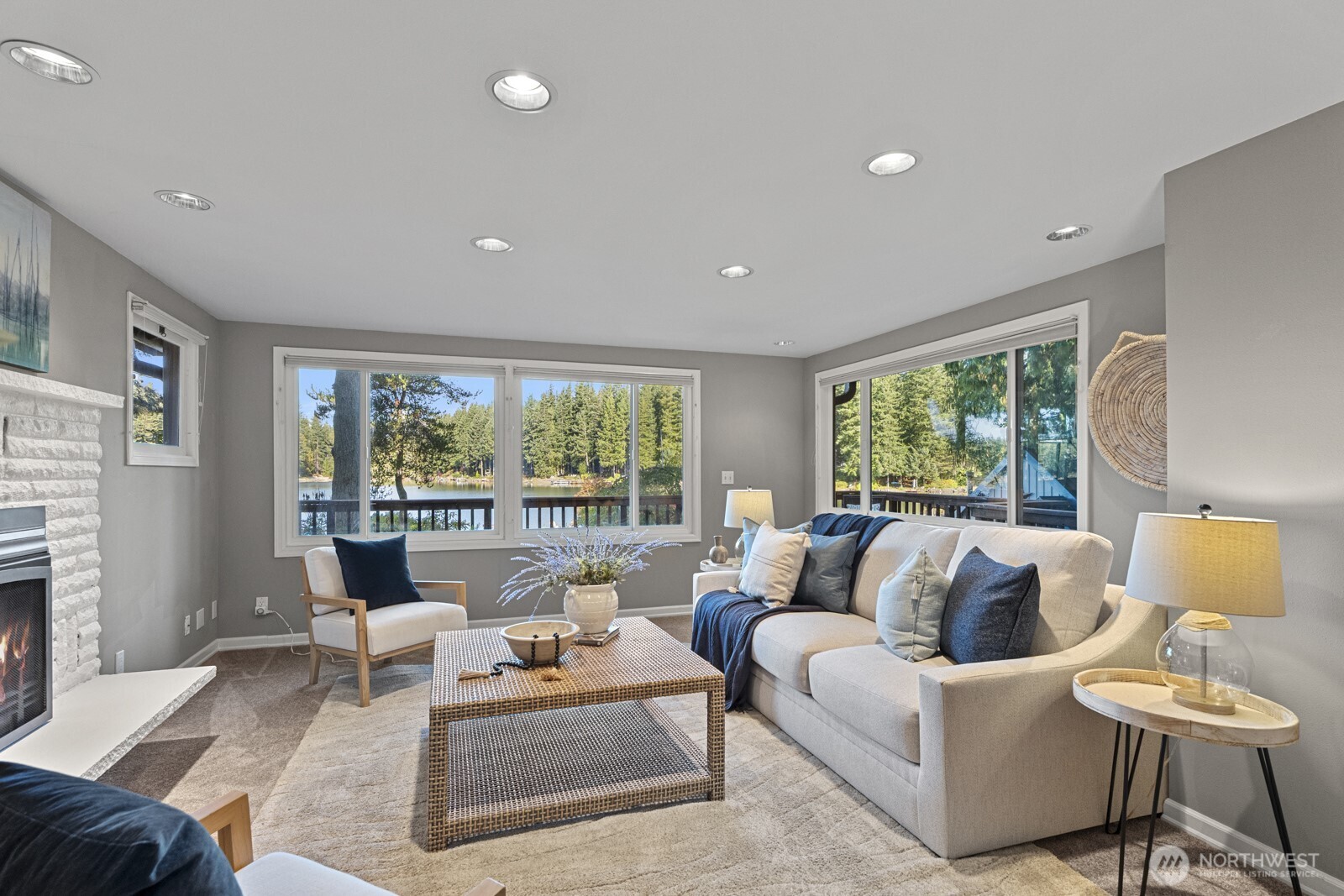 7727 Lake Alice Road Southeast Fall City, WA 98024 - Photo 6 of 34 a living room with furniture and a large window
