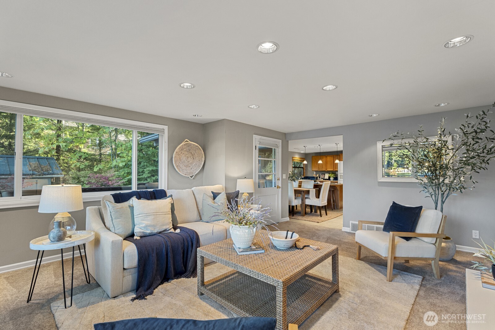 7727 Lake Alice Road Southeast Fall City, WA 98024 - Photo 7 of 34 a living room with furniture a rug and a large window