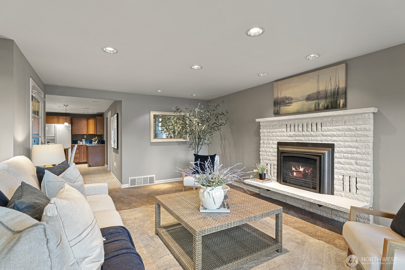 7727 Lake Alice Road Southeast Fall City, WA 98024 - Photo 8 of 34 a living room with furniture and a fireplace