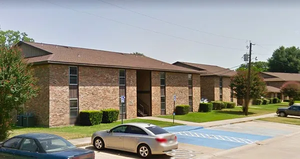 a car parked in front of a house