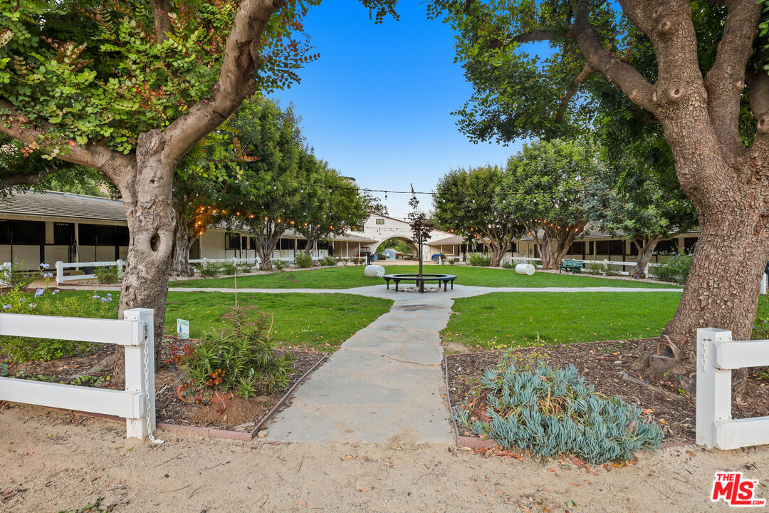 53 Saddlebow Road Bell Canyon, CA 91307 - Photo 64 of 66 a view of a park with large trees