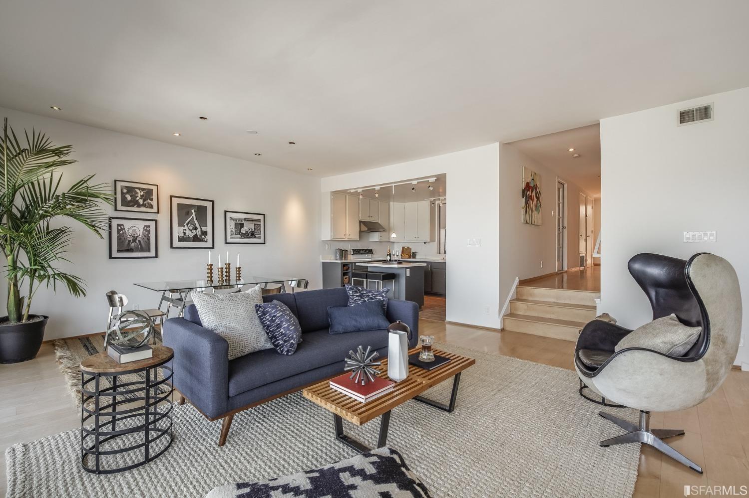 138 Corwin Street San Francisco, CA 94114 - Photo 17 of 60 a living room with furniture and wooden floor