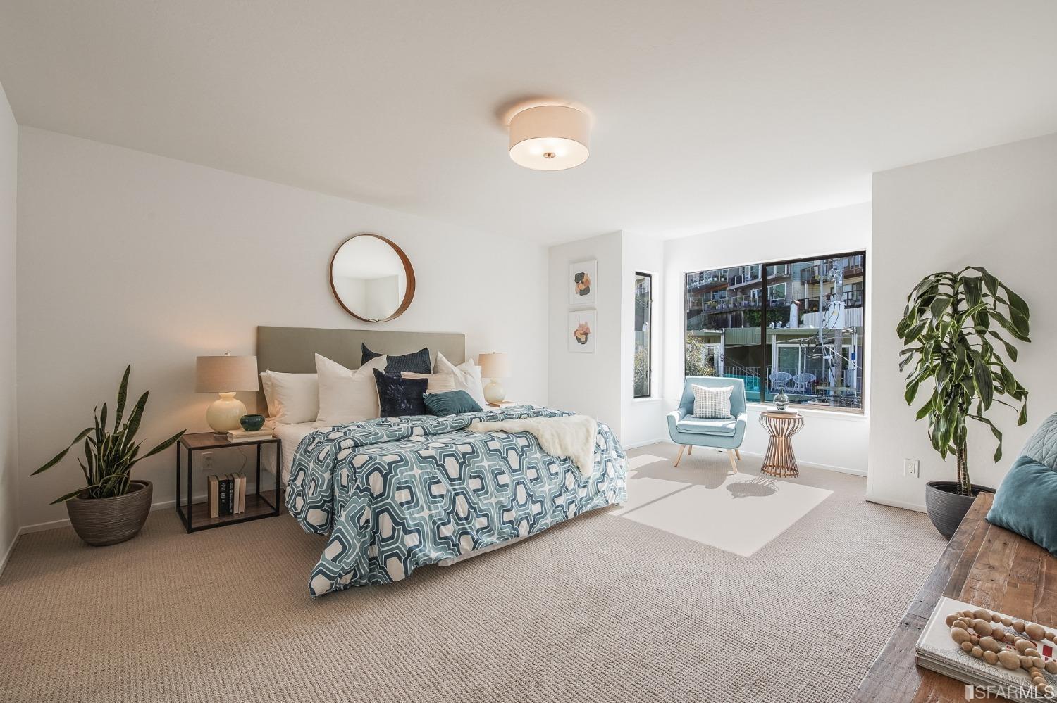 138 Corwin Street San Francisco, CA 94114 - Photo 42 of 60 a bedroom with bed and a large window