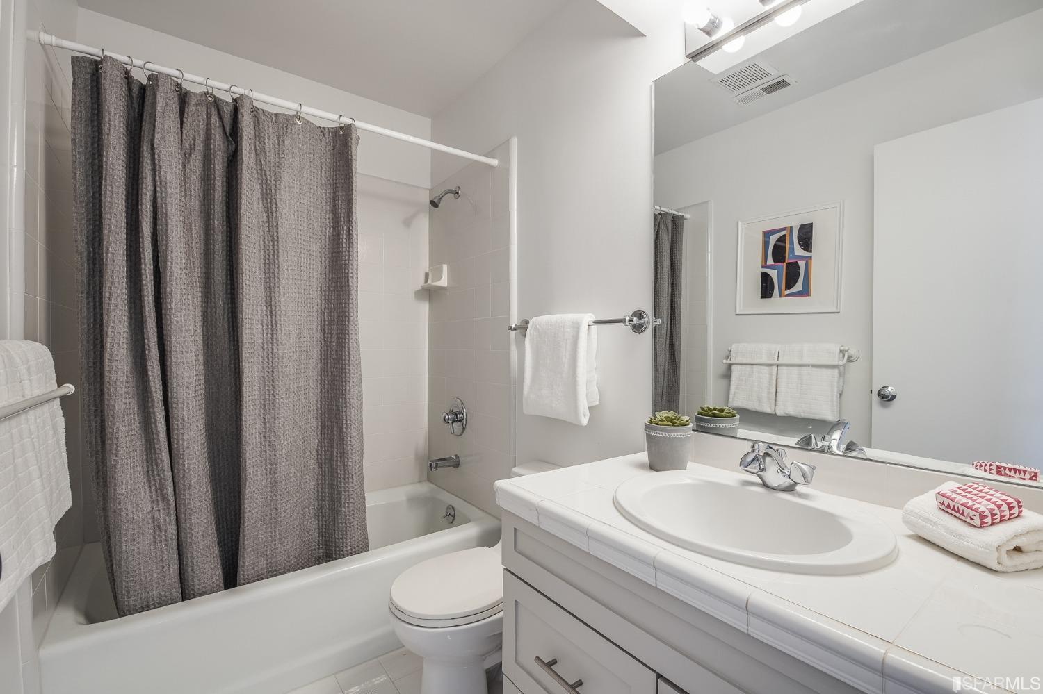 138 Corwin Street San Francisco, CA 94114 - Photo 48 of 60 a bathroom with a sink toilet and shower