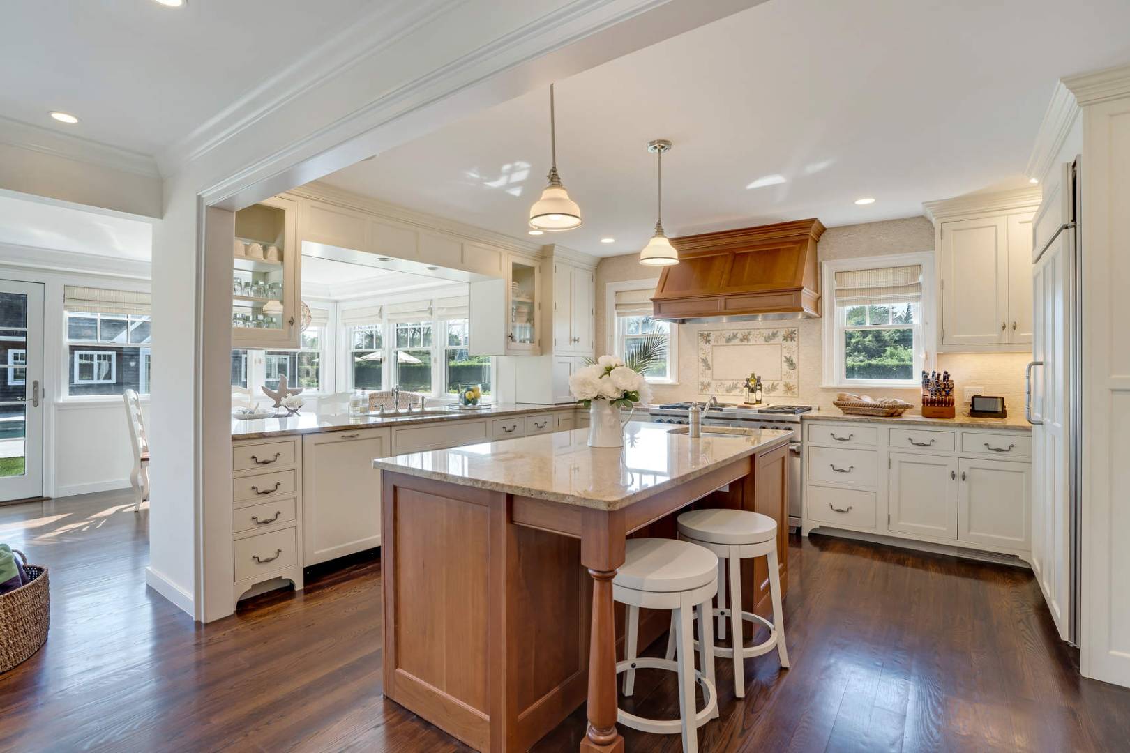 91 Osprey Way Water Mill, NY 11976 - Photo 15 of 46 a kitchen with center island cabinets and wooden floor