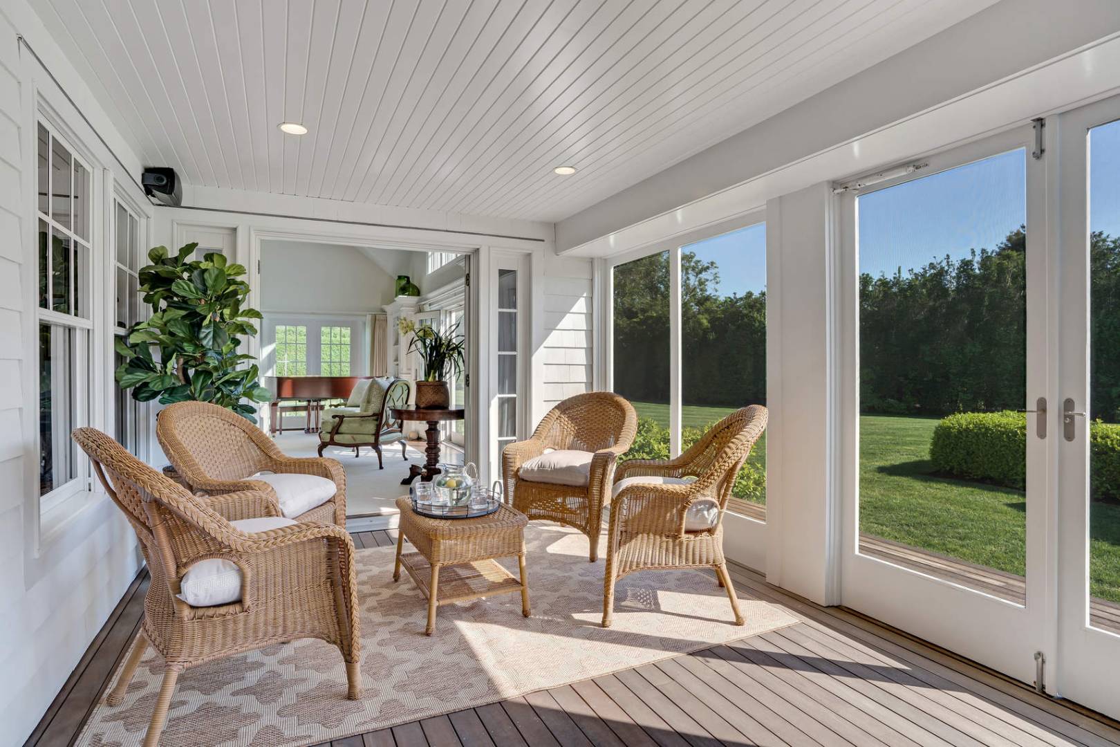 91 Osprey Way Water Mill, NY 11976 - Photo 16 of 46 a dining room with furniture wooden floor and garden view