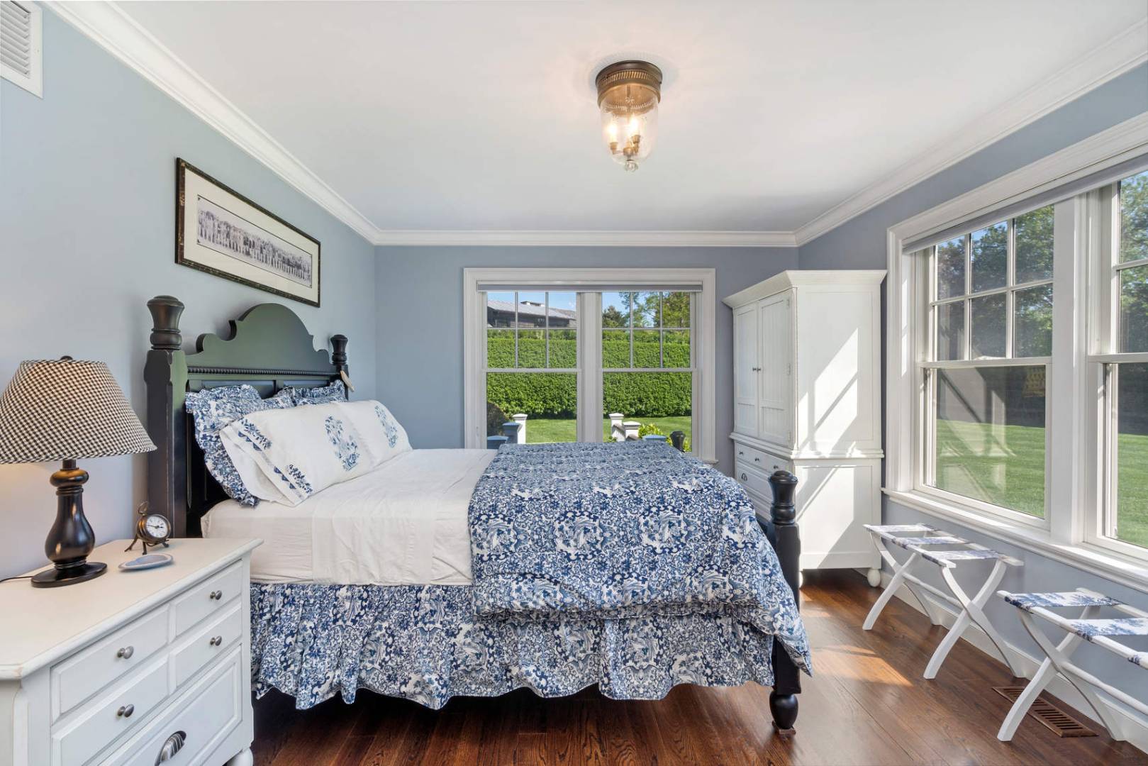 91 Osprey Way Water Mill, NY 11976 - Photo 21 of 46 a bedroom with a bed and a window