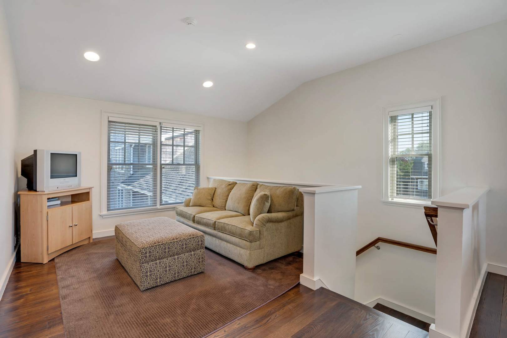91 Osprey Way Water Mill, NY 11976 - Photo 26 of 46 a living room with furniture and a flat screen tv