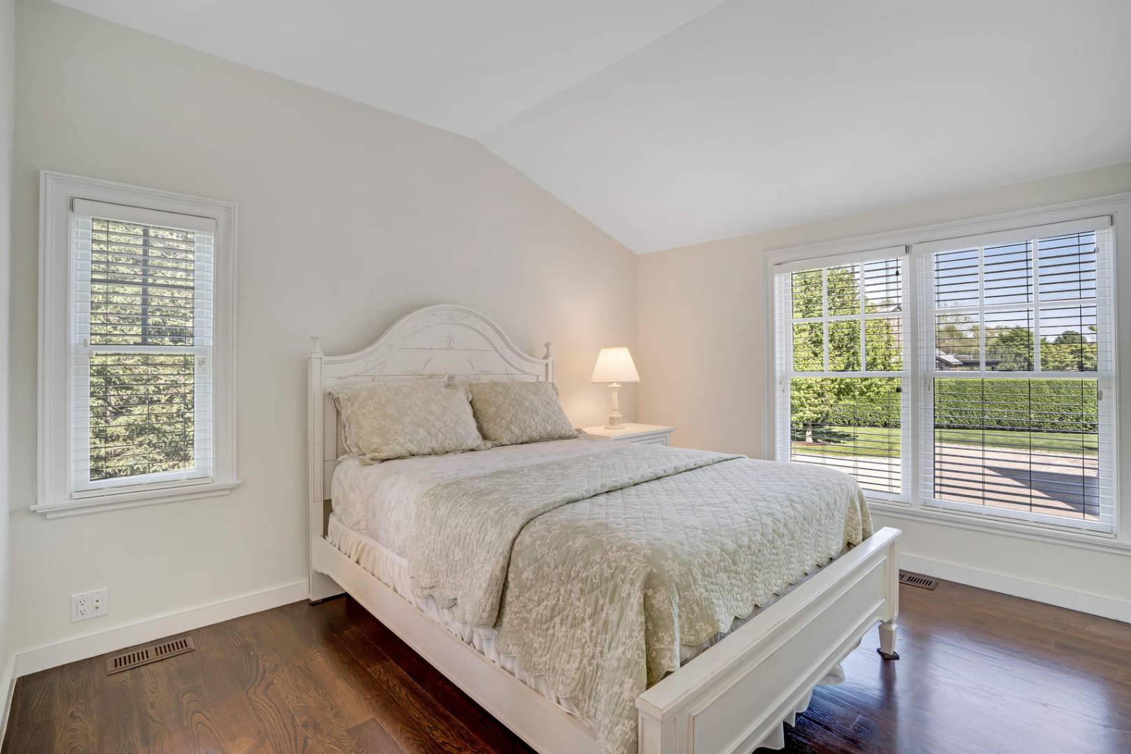 91 Osprey Way Water Mill, NY 11976 - Photo 28 of 46 a bedroom with a bed and window