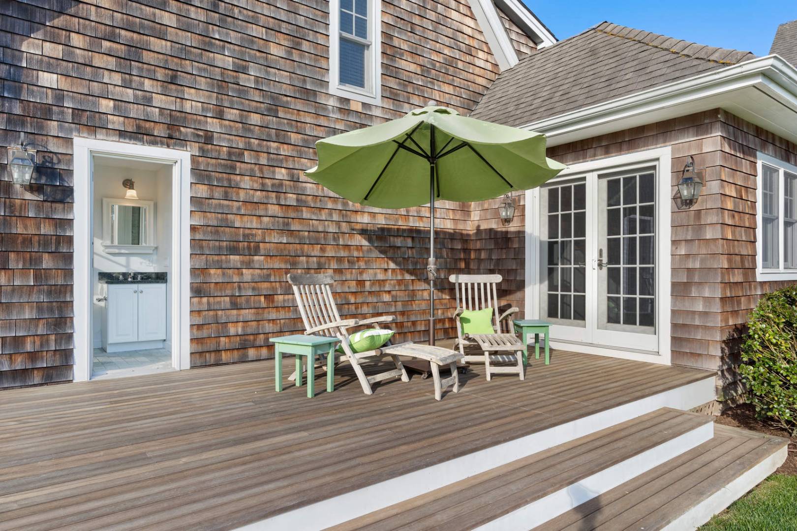 91 Osprey Way Water Mill, NY 11976 - Photo 4 of 46 a view of a two chairs and table on the wooden floor