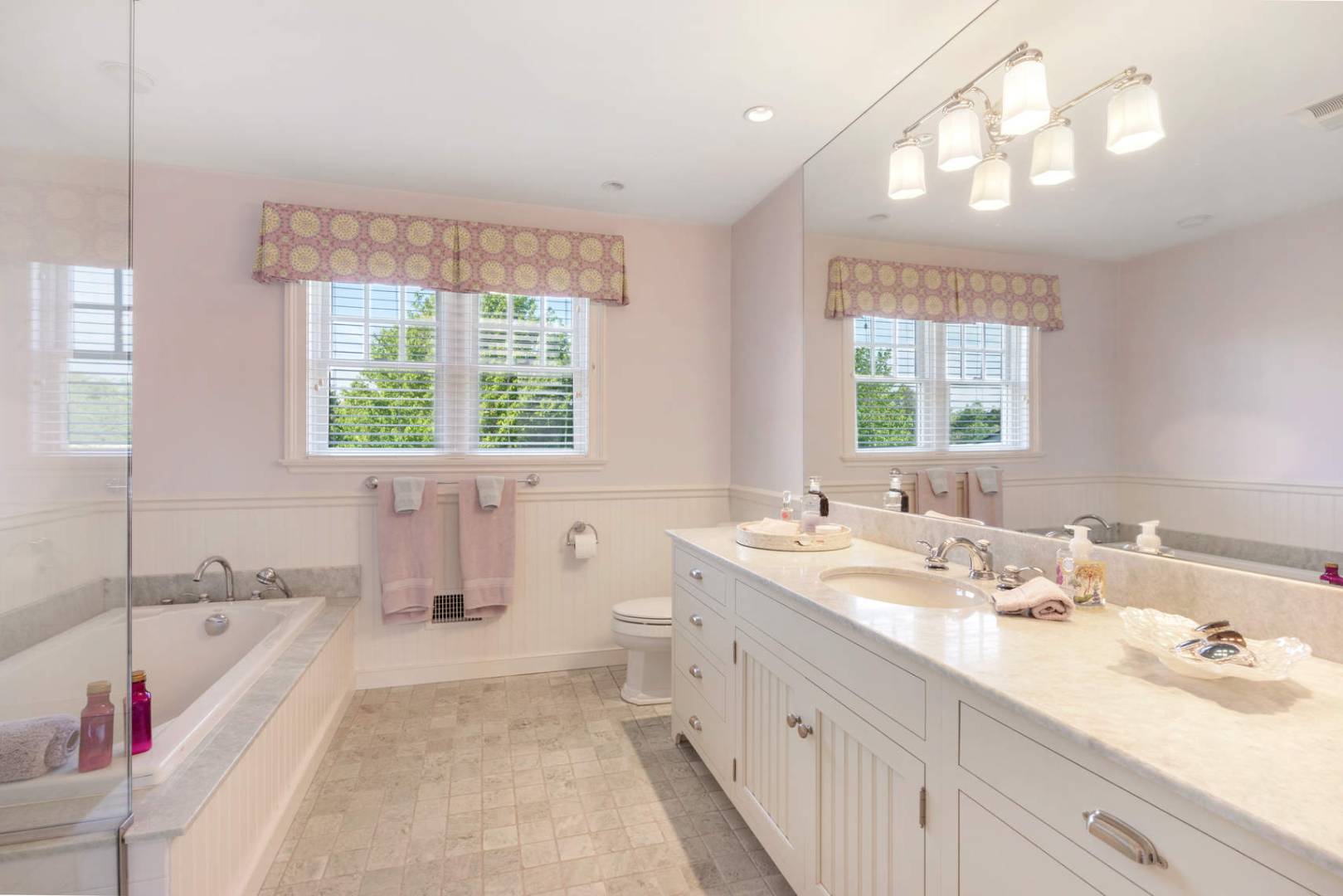 91 Osprey Way Water Mill, NY 11976 - Photo 32 of 46 a spacious bathroom with a tub sink and mirror