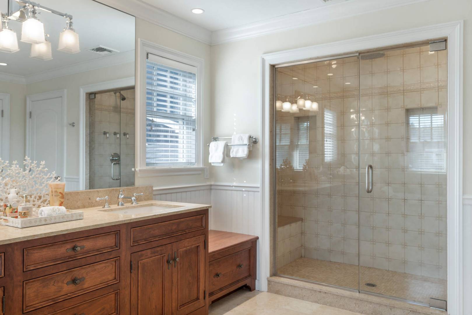 91 Osprey Way Water Mill, NY 11976 - Photo 37 of 46 a bathroom with a shower sink and mirror