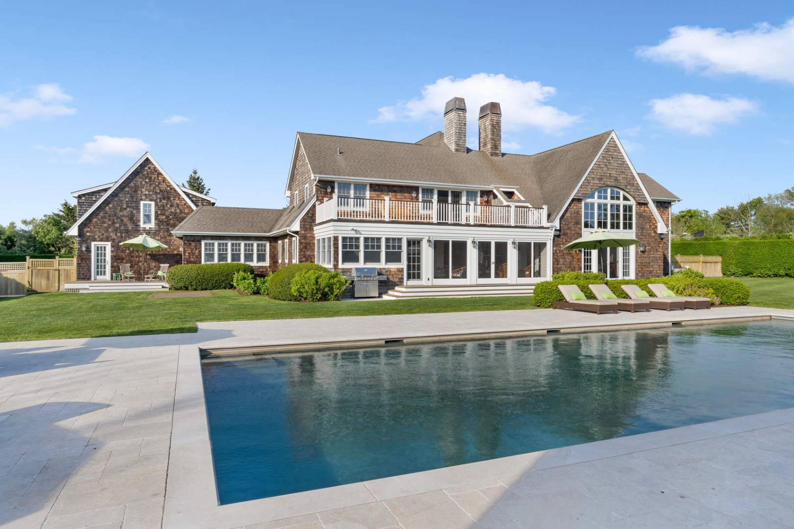 91 Osprey Way Water Mill, NY 11976 - Photo 5 of 46 a front view of a house with a yard