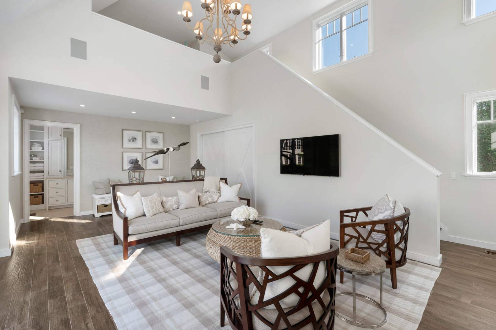 91 Osprey Way Water Mill, NY 11976 - Photo 44 of 46 a living room with furniture and a flat screen tv