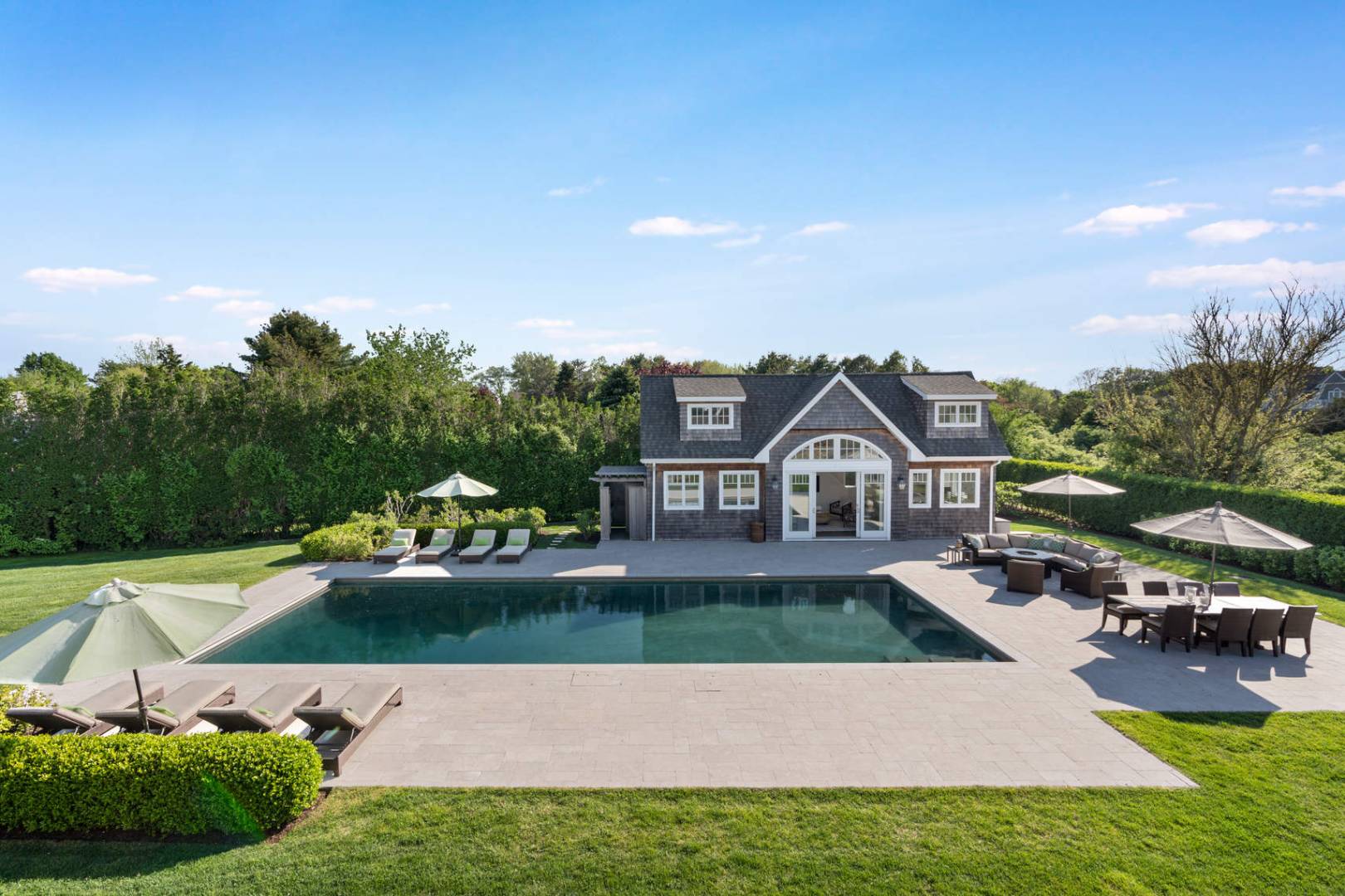 91 Osprey Way Water Mill, NY 11976 - Photo 8 of 46 a view of yard with swimming pool and seating area