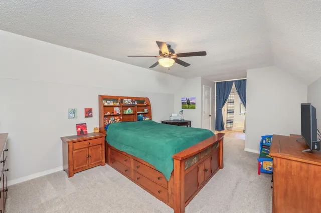 a view of entryway with wooden floor and livingroom