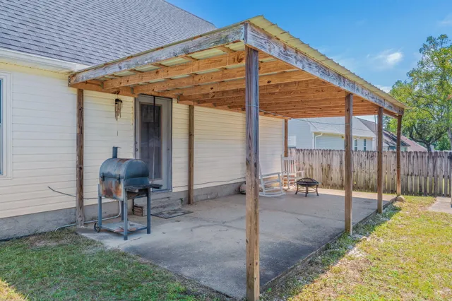 a view of an empty room with a house