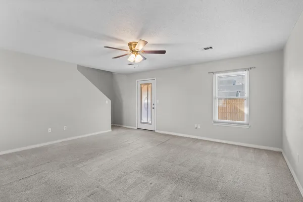 a kitchen with a stove and a microwave