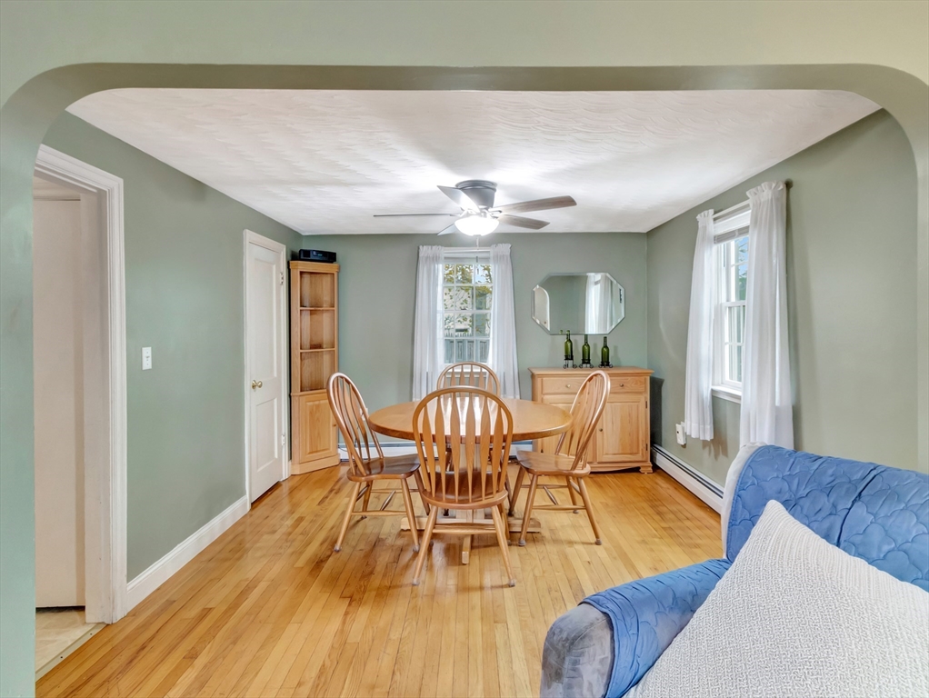 5 G Street Hull, MA 02045 - Photo 13 of 41 a view of a dining room with furniture and wooden floor