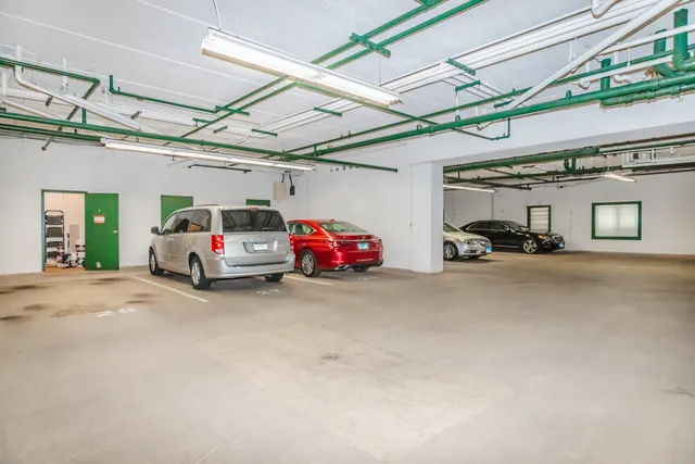 a view of storage and utility room with washer and dryer