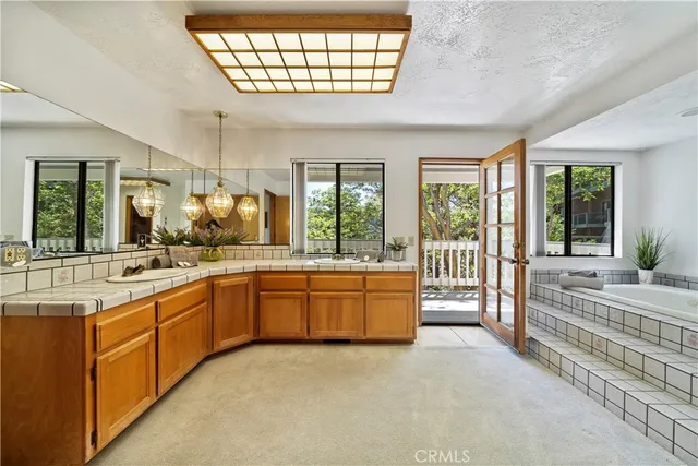a view of balcony with furniture