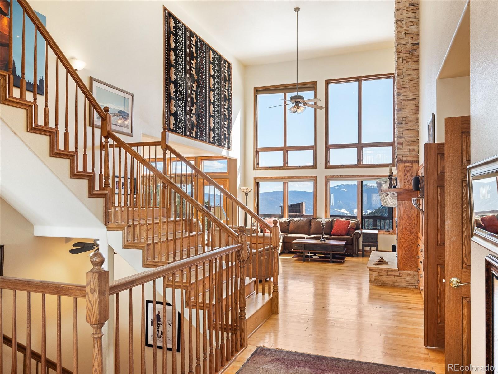 76 Raven Rdg Road Idaho Springs, CO 80452 - Photo 15 of 49 a view of entryway livingroom and hall with wooden floor