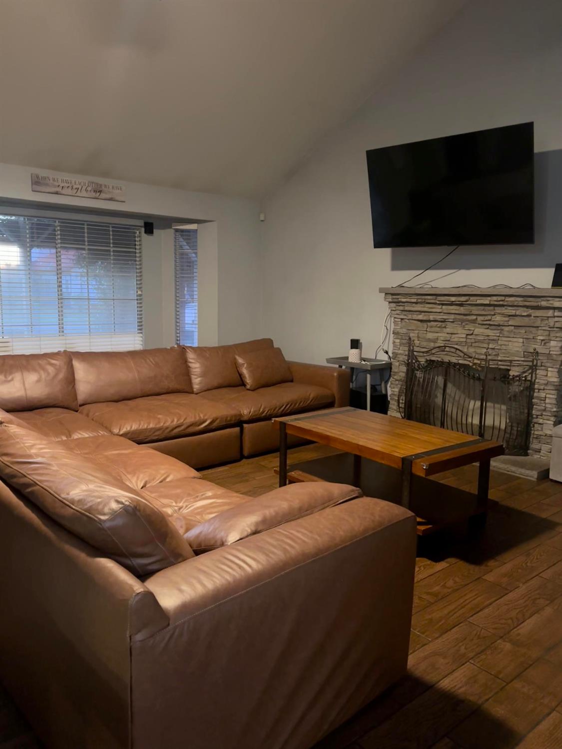 3608 Cassie Lane Ceres, CA 95307 - Photo 13 of 25 a living room with furniture and a flat screen tv
