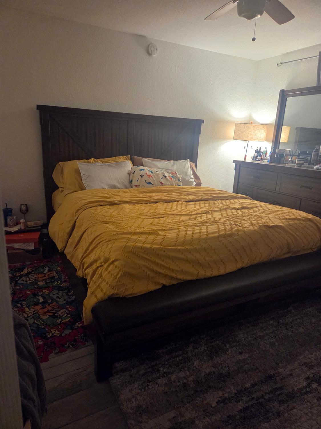3608 Cassie Lane Ceres, CA 95307 - Photo 2 of 25 a bed sitting in a bedroom next to a lamp