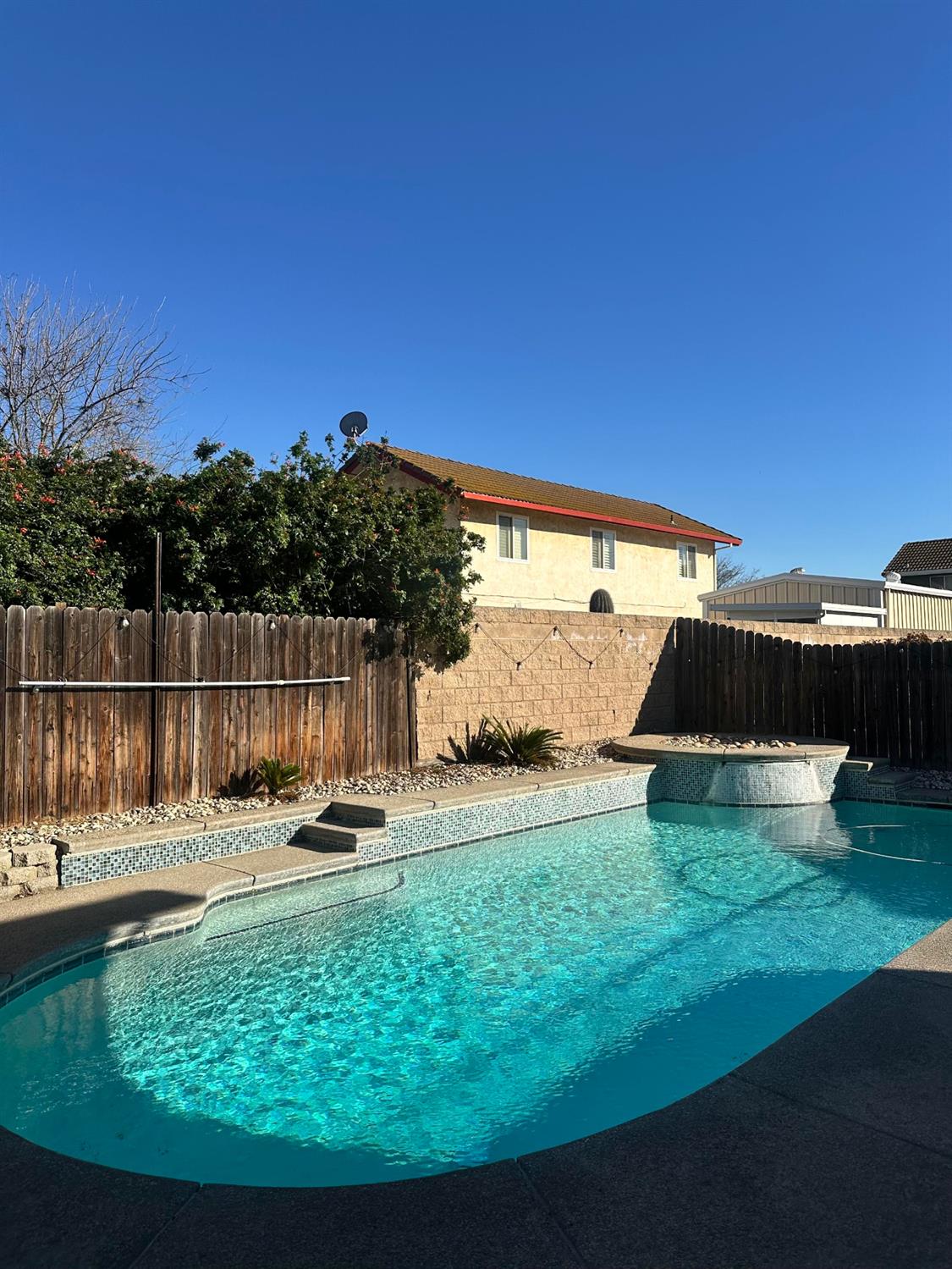 3608 Cassie Lane Ceres, CA 95307 - Photo 8 of 25 a view of a backyard with swimming pool