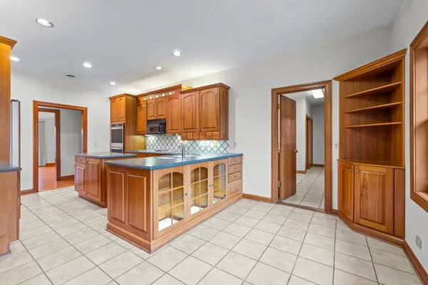 a dining room with furniture window and wooden floor