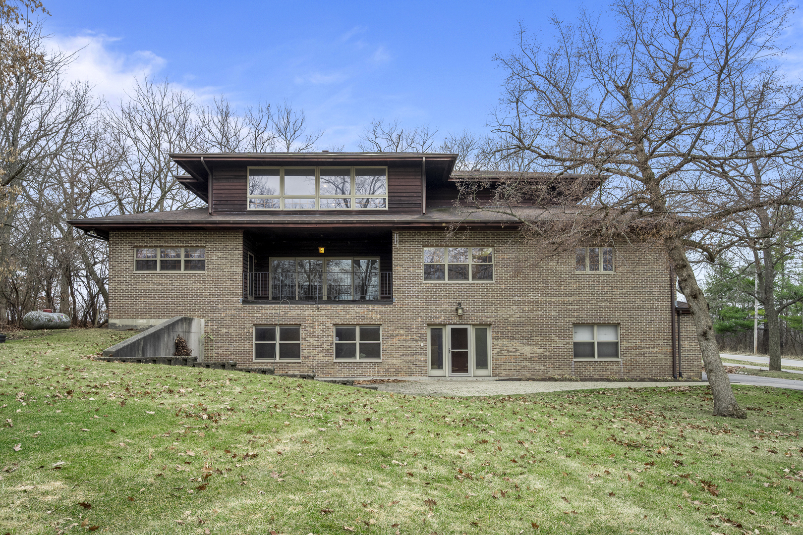32981 North River Road Libertyville, IL 60048 - Photo 2 of 44 front view of a house with a yard